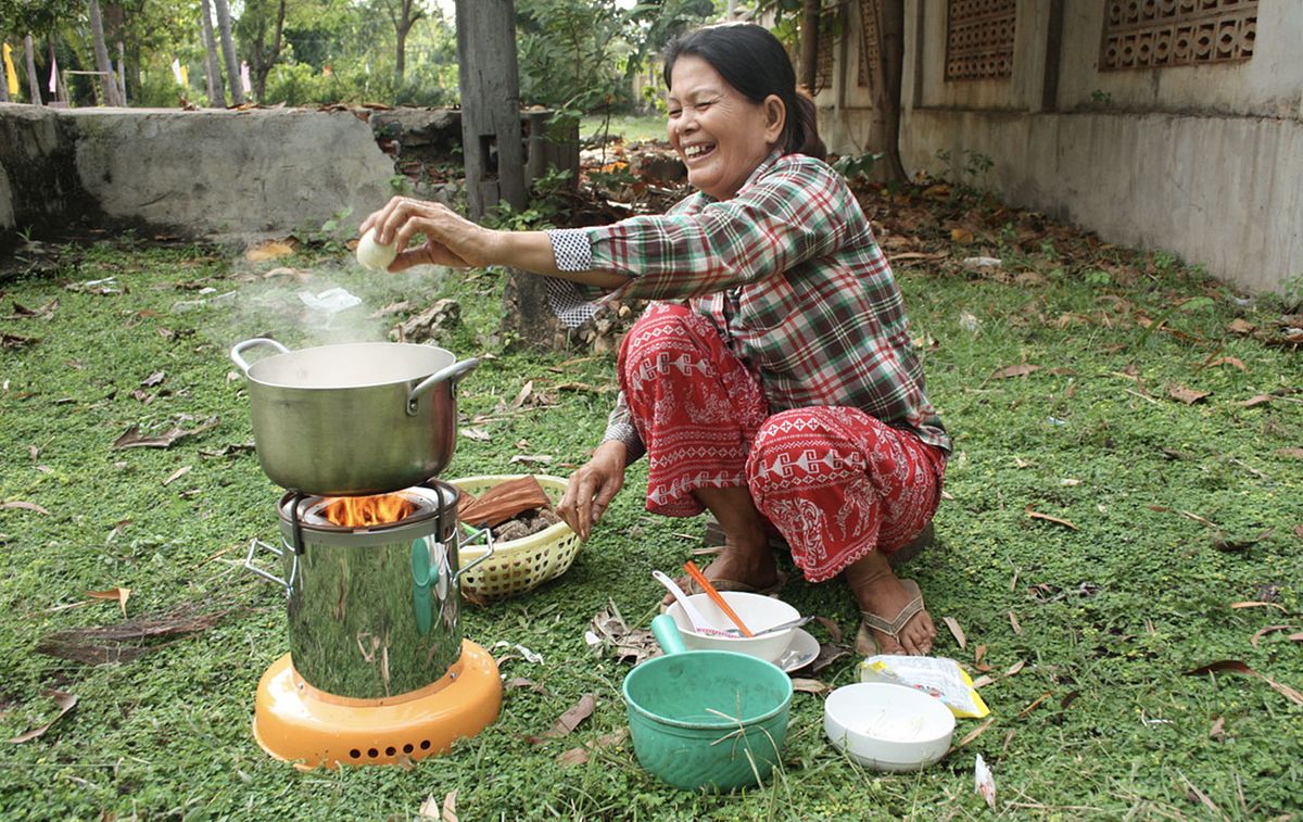 ACE customer using the cookstove in Cambodia